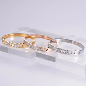 Detailed shot of triple-color woven stainless steel bracelets with sparkling zircon stones