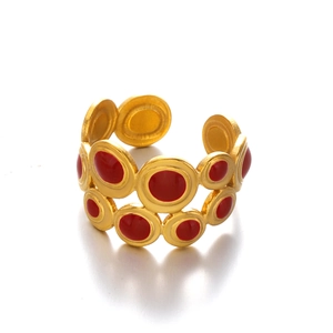 Golden wide open cuff bracelet with geometric red enamel circles in vintage style