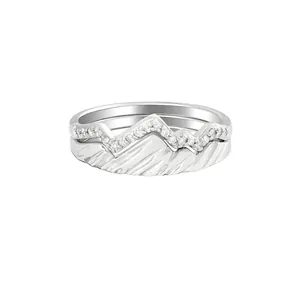 Silver glacier mountain rings set with micro-pave crystals and textured peak design