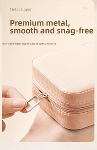 Macro shot of smooth metal zipper on compact peach pink quilted jewelry box
