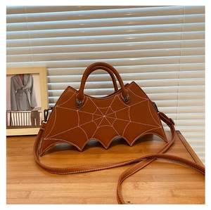 Brown PU leather bat wing handbag with white spider web embroidery and silver spider buckle