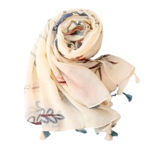 Beige floral scarf with cotton-linen feel and blue-white tassels on white background