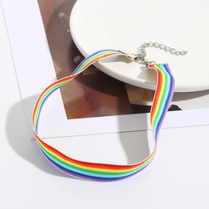 Detail of colorful rainbow ribbon choker with metal lobster clasp and adjustable chain