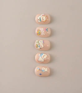 Detail of 5D embossed cute dog nail stickers with 3D cartoon art on beige press-on nails