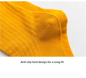 Close-up of ginger yellow ribbed cotton sock heel with anti-slip ergonomic design
