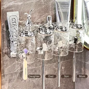 Wall-mounted toothbrush holder with 4 glacier ripple cups and silver rabbit decor