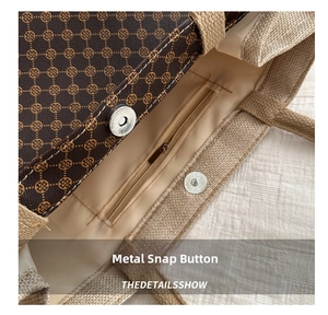 Close-up of linen tote interior featuring metal magnetic buckle and zippered pocket