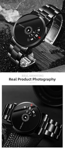 Detail of minimalist black stainless steel watch with rotating scale concept dial