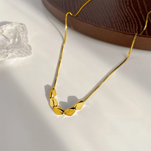 Gold rhombus geometric pendant necklace with polished metal beads and fine box chain