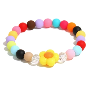 Colorful acrylic beaded bracelet with yellow flower charm on a clean white background