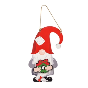 Wooden Christmas gnome door hanger with red hat and green festive wreath decoration