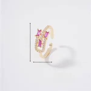 Detailed view of pink rectangular stone ring with size dimensions and gold finish