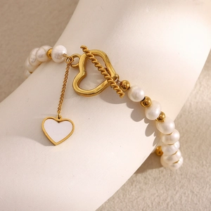 Elegant 18K gold plated stainless steel pearl bracelet with white heart enamel charm