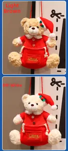 Detail of light brown and off-white Christmas teddy bear plush bags with gold embroidery