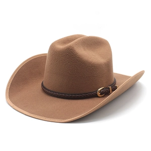 Close-up of brown felt cowboy hat featuring a braided leather band and gold buckle