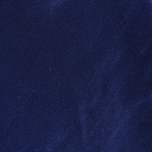 Detailed close-up of dark blue fabric texture with subtle shimmering silk and fine weave