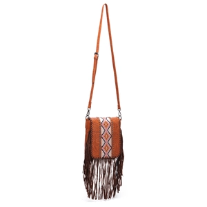 Detail of vintage bohemian crossbody bag with long tassels and ethnic floral embossing