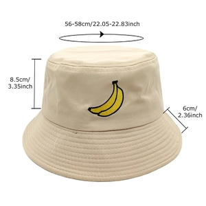 Beige cotton bucket hat with banana embroidery and 56-58cm head circumference size specs