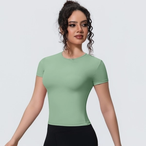 Detail of slim-fit yoga T-shirt in bean green showing breathable fabric and stitching
