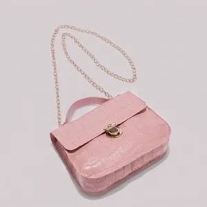 Pink crocodile pattern square handbag with gold chain strap and metal swivel lock