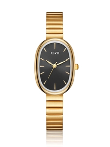 Detailed close-up of an oval black dial wristwatch with a golden steel mesh strap