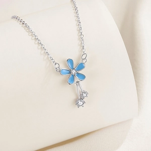 Elegant S925 sterling silver necklace with light blue flower pendant and zircon tassel