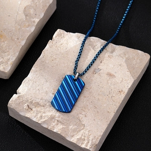 Blue rectangular tag pendant necklace with wave texture on premium cream stones