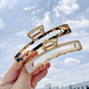 Elegant large tortoiseshell and pearl white acetate hair claws with gold-plated frames