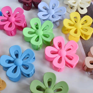 Floral matte hair clips in vibrant macaron colors on a clean white background