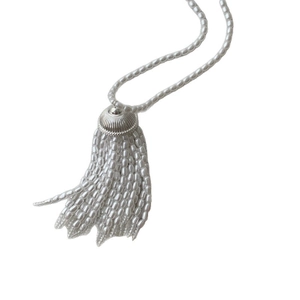 Elegant white pearl tassel necklace with silver accents and fringe detail for women