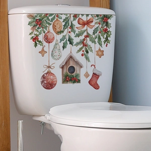 Christmas toilet sticker set featuring holly berries, baubles, and festive cabins decoration
