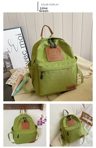 Detail of fruit green canvas backpack with leather handle and side pocket for kids