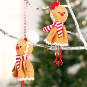 Cute gingerbread man Christmas tree ornaments made of felt with festive red scarves