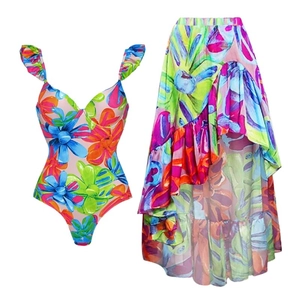Vibrant floral print bikini set with ruffle straps and high-low irregular skirt
