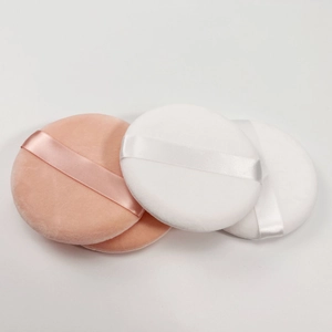 Set of four 9cm ultra-soft velvet powder puffs in pink and white with ribbons