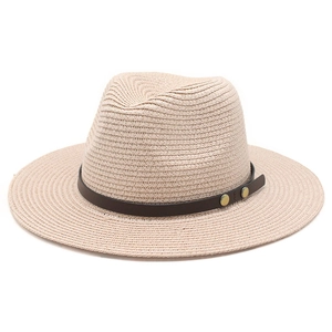 Classic beige woven straw fedora hat for summer beach wear with a brown leather band
