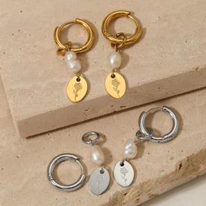 Elegant stainless steel hoop earrings with natural pearls and rose engraved oval pendants