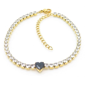 Bracelet tennis doré avec pierres blanches et un pendentif central en forme de cœur noir