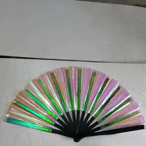 Detail of iridescent laser kung fu fan with black bamboo ribs and vibrant color shift
