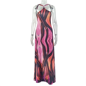 Detailed halter neck and abstract fluid print on a slim fit maxi backless dress