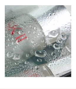 Macro detail of water droplets on waterproof transparent PVC cosmetic bag surface