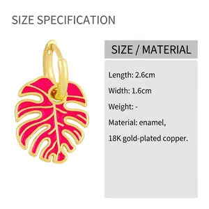 Detail of 18K gold plated copper leaf earrings with pink enamel and tropical veins