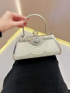 Elegant white evening clutch bag with pearl and rhinestone embellishments and metal handle
