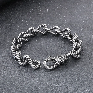 Vintage oxidized silver twisted rope link bracelet for men with baroque carved clasp