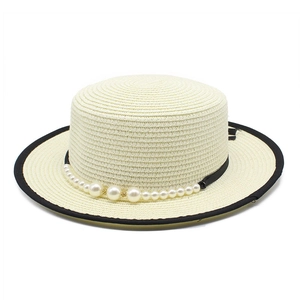 Elegant wide brim boater straw hat with black piping and pearl band embellishments