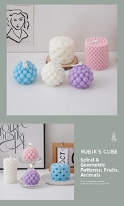 Macro shot of geometric bubble and pillar candles in pastel colors for home decor