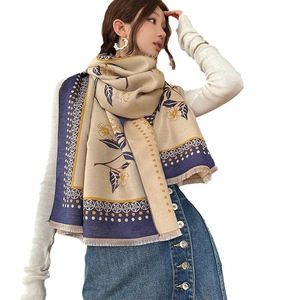 Elegant floral knit scarf with fringe details and vintage botanical pattern for women