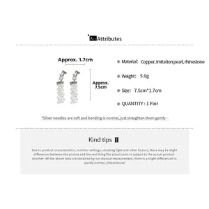 Detailed specs of long pearl tassel earrings featuring silver finish and crystal accents