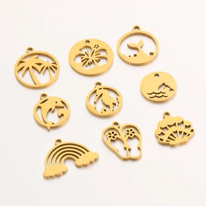 Set of 9 gold stainless steel ocean charms including palm tree shell and seahorse