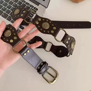 Vintage brown leather belt with metal rivets and floral buckle for women's jeans
